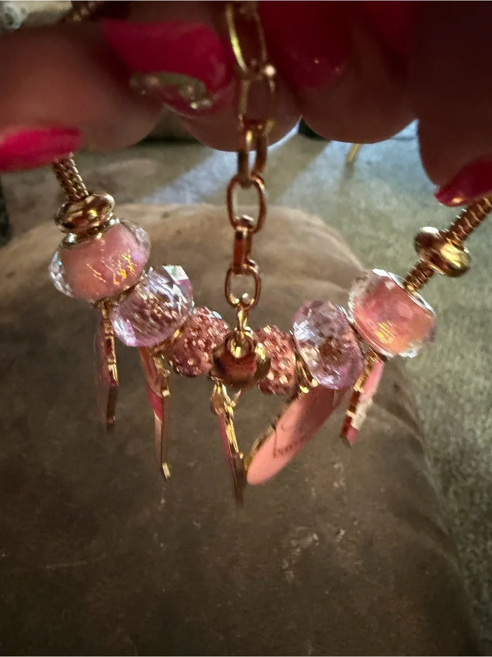 Gold-Tone Pink Charm Bracelet with Crystal Beads